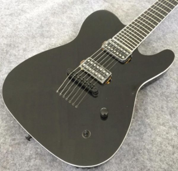 custom-made electric guitar solid black finished neck thru body 7 string locking tuners
custom-made electric guitar solid black finished neck thru body 7 string locking tuners