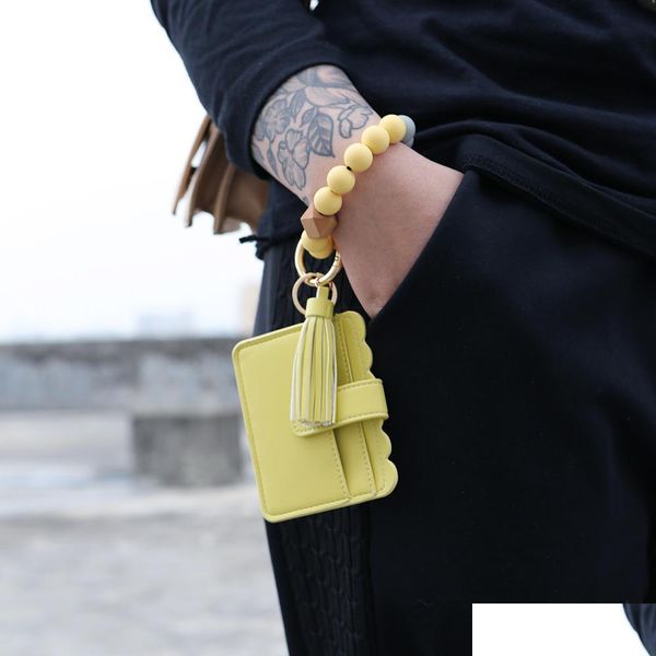 charm bracelets leather card bag tassel charm bracelets sile bead wristband cuff wallet keychain for women fashion drop delivery jewe dhyc9, Golden;silver
charm bracelets leather card bag tassel charm bracelets sile bead wristband cuff wallet keychain for women fashion drop delivery jewe dhyc9, Golden;silver