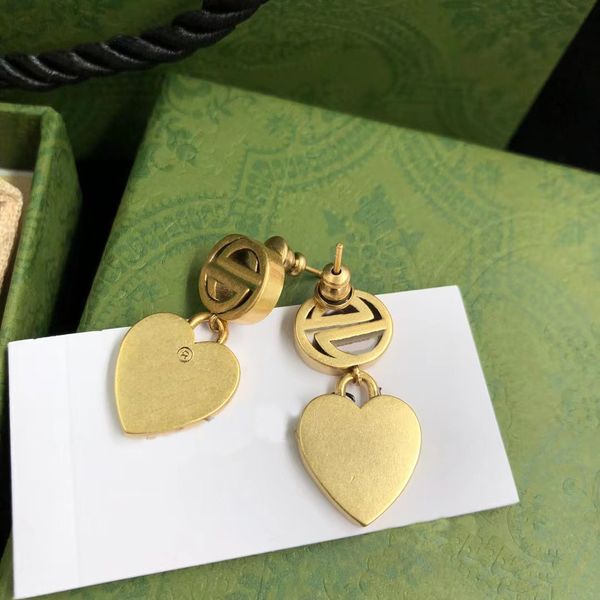 charm earrings double g letter brass material hypoallergenic earring simple fashion luxury brand designer big star pop ladies earrings high-, Golden
charm earrings double g letter brass material hypoallergenic earring simple fashion luxury brand designer big star pop ladies earrings high-, Golden