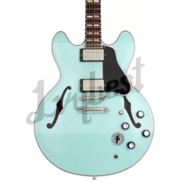 customized electric guitar double cutaway thinline guitar with gloss finish sea foam green body. front and sides wood
customized electric guitar double cutaway thinline guitar with gloss finish sea foam green body. front and sides wood