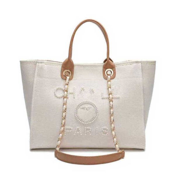 fashion luxury women's evening bags ch brand canvas handbag classic pearl beach hand bag designer female large backpack small packs por
fashion luxury women's evening bags ch brand canvas handbag classic pearl beach hand bag designer female large backpack small packs por