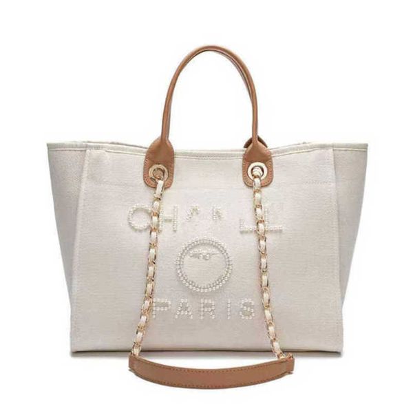 fashion luxury women's evening bags ch brand canvas handbag classic pearl beach hand bag designer female large backpack small packs por
fashion luxury women's evening bags ch brand canvas handbag classic pearl beach hand bag designer female large backpack small packs por