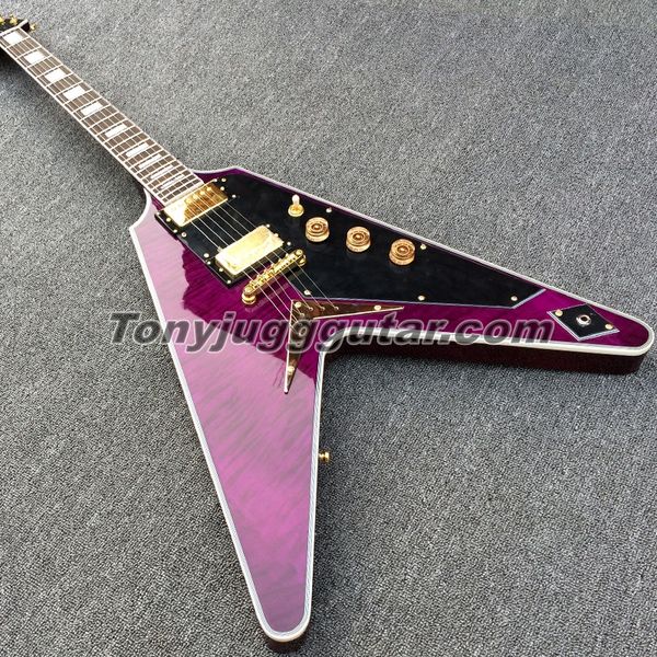 purple flame maple flying v electric guitar string thru body bridge black pickguard gold hardware white mop block inlay 
purple flame maple flying v electric guitar string thru body bridge black pickguard gold hardware white mop block inlay