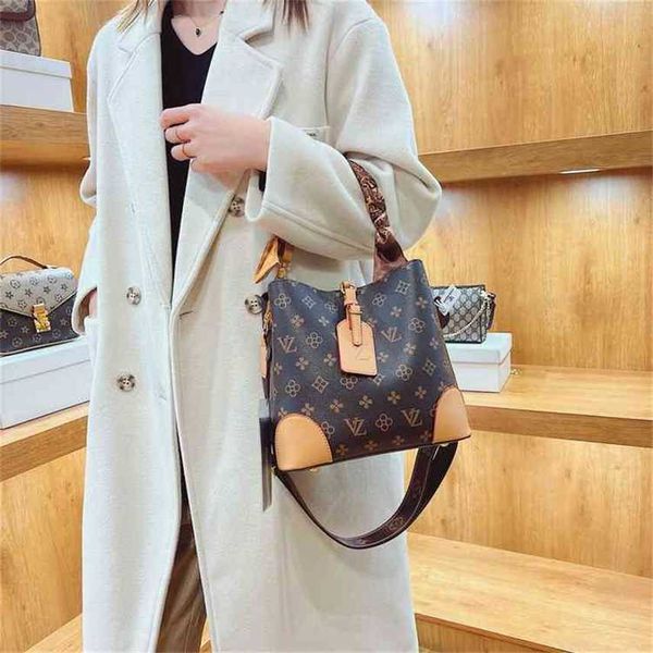 high sense large capacity flower bucket bag women's popular silk scarf hand messenger sling shoulder in the handbags design deals
high sense large capacity flower bucket bag women's popular silk scarf hand messenger sling shoulder in the handbags design deals
