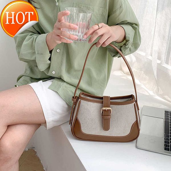 women's designer bag new bag small number canvas shoulder ins fashion splicing hand factory direct sales 
women's designer bag new bag small number canvas shoulder ins fashion splicing hand factory direct sales
