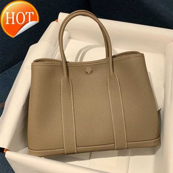 women's luxury designer handbags 2023 new texture leather garden bag large capacity portable bucket single shoulder crossbody bags fact
women's luxury designer handbags 2023 new texture leather garden bag large capacity portable bucket single shoulder crossbody bags fact