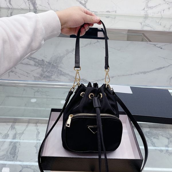 timeless classic mini drawstring bucket nylon bags triangle badge handle totes crossbody shoulder designer outdoor sacoche purse cosmetic ca
timeless classic mini drawstring bucket nylon bags triangle badge handle totes crossbody shoulder designer outdoor sacoche purse cosmetic ca