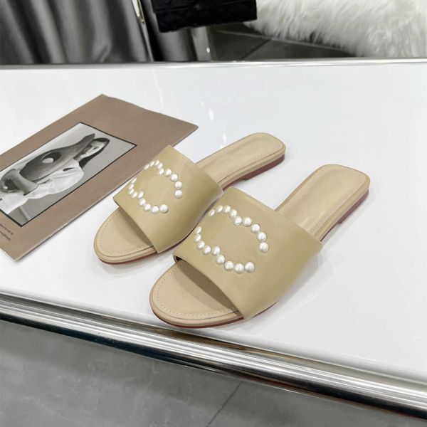 23 high-end leather flat slippers simple elegant ladies pearl open-toe sandals designer lightweight non-slip flip flops luxury, Black
23 high-end leather flat slippers simple elegant ladies pearl open-toe sandals designer lightweight non-slip flip flops luxury, Black