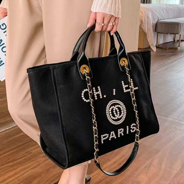 luxury women's classic evening bags ch brand canvas handbag fashion pearl beach hand bag designer female large backpack small packs por
luxury women's classic evening bags ch brand canvas handbag fashion pearl beach hand bag designer female large backpack small packs por
