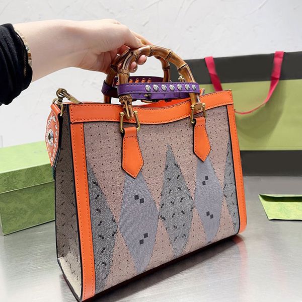 women tote bag canvas shoulder bags bamboo handbag purse rivet leather handle patchwork leather large capacity crossbody pocket letter print
women tote bag canvas shoulder bags bamboo handbag purse rivet leather handle patchwork leather large capacity crossbody pocket letter print