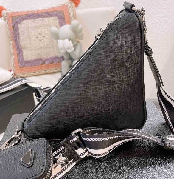 woman evening bags shoulder bag prabag crossbody women triangle designer bags handbag purse wallet strap fashion letters composite wallets 2
woman evening bags shoulder bag prabag crossbody women triangle designer bags handbag purse wallet strap fashion letters composite wallets 2