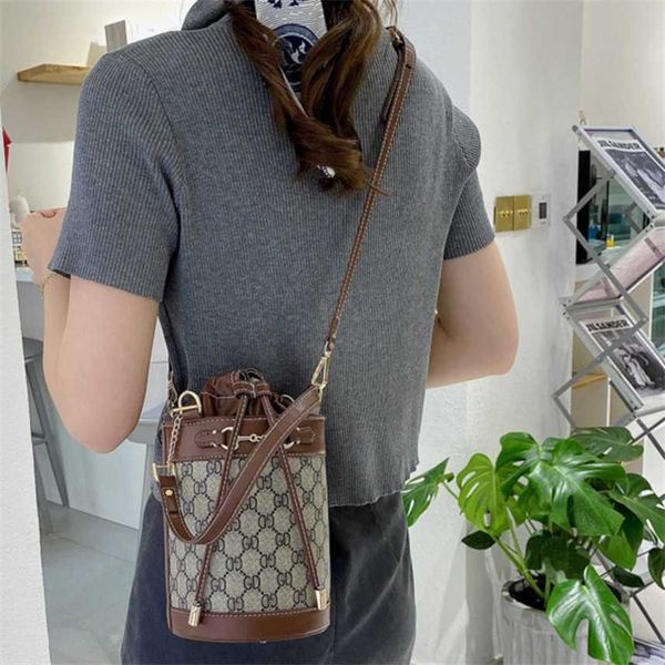 bag new toilet buckle chain bucket one shoulder hand fashion printed messenger bag women
bag new toilet buckle chain bucket one shoulder hand fashion printed messenger bag women