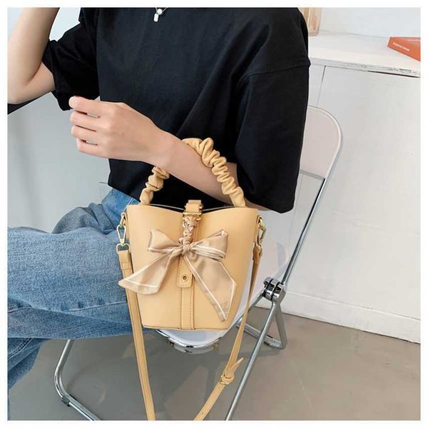 style small bag summer new fashion messenger women's simple portable bucket outlet purse, Black;red
style small bag summer new fashion messenger women's simple portable bucket outlet purse, Black;red