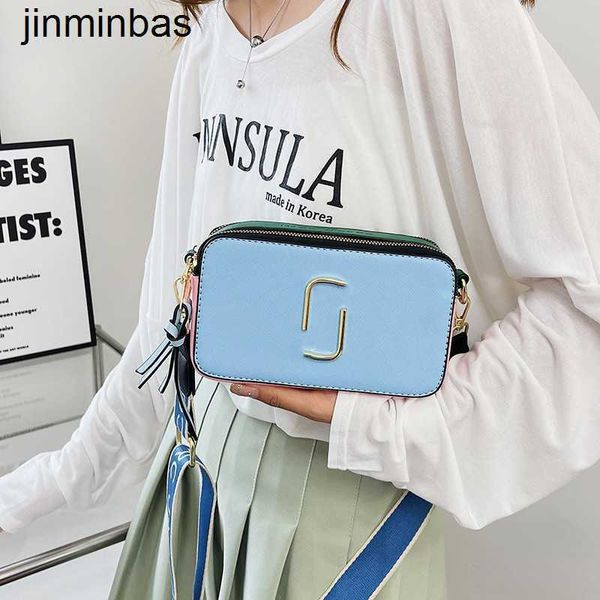 design bag shop 80% factory wholesale and retail new women's simple color contrast camera versatile fashion letter msenger
design bag shop 80% factory wholesale and retail new women's simple color contrast camera versatile fashion letter msenger