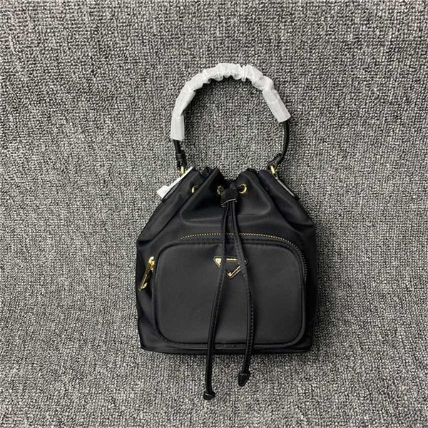 purse bag female autumn and winter new family drawstring bucket bag nylon cloth hand sling one shoulder messenger women's outlet black
purse bag female autumn and winter new family drawstring bucket bag nylon cloth hand sling one shoulder messenger women's outlet black