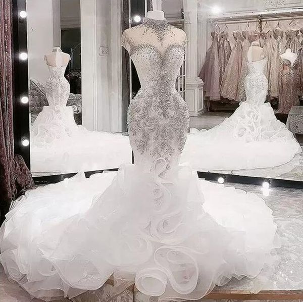 luxurious beaded crystals mermaid wedding dresses plus size arabic aso ebi sheer cap sleeves high neck lace applique ruffles bridal gowns 11, White
luxurious beaded crystals mermaid wedding dresses plus size arabic aso ebi sheer cap sleeves high neck lace applique ruffles bridal gowns 11, White