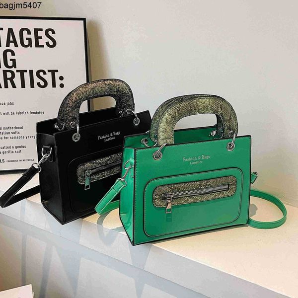 design bag shop 80% factory wholesale and retail snake color blocking pu leather hand new style small square temperament one shoulder fashio
design bag shop 80% factory wholesale and retail snake color blocking pu leather hand new style small square temperament one shoulder fashio