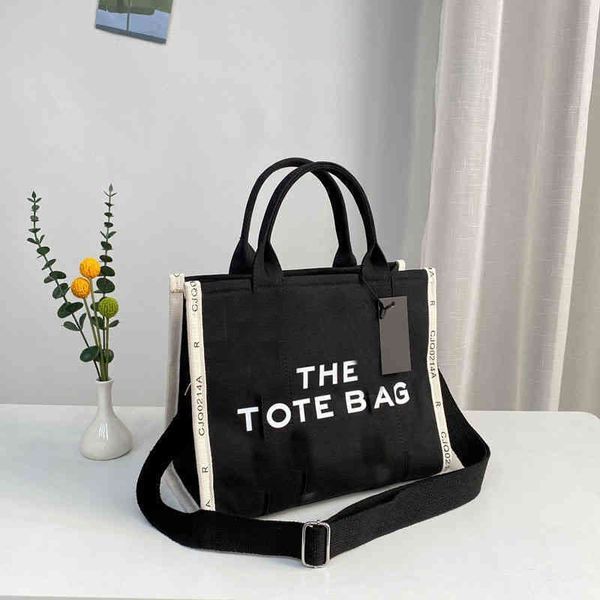 designer marc tote bags canvas handbags large capacity shoulder women shopping messenger letters print
designer marc tote bags canvas handbags large capacity shoulder women shopping messenger letters print