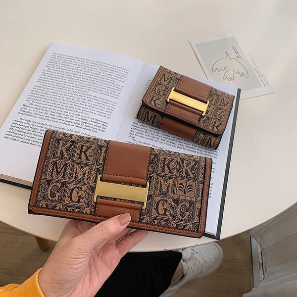fashion new purse women's long buckle money clip multi card holding trend card bag, Red;black
fashion new purse women's long buckle money clip multi card holding trend card bag, Red;black