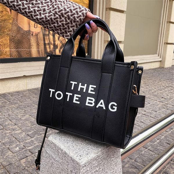 the tote bag designer totes black large classic capacity purse crossbody bags casual square backpack women shoulder handbags
the tote bag designer totes black large classic capacity purse crossbody bags casual square backpack women shoulder handbags