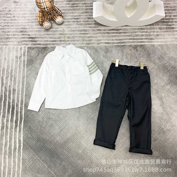 designer clothing sets children's four bar shirt set british style simple long sleeved white shirt casual pants handsome two-piece set
designer clothing sets children's four bar shirt set british style simple long sleeved white shirt casual pants handsome two-piece set