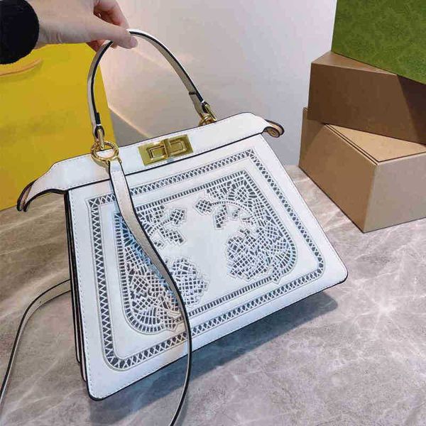 new shoulder bags embroidered handbag high capacity messenger fashion wallet brand designer genuine leather purses for women 1127
new shoulder bags embroidered handbag high capacity messenger fashion wallet brand designer genuine leather purses for women 1127