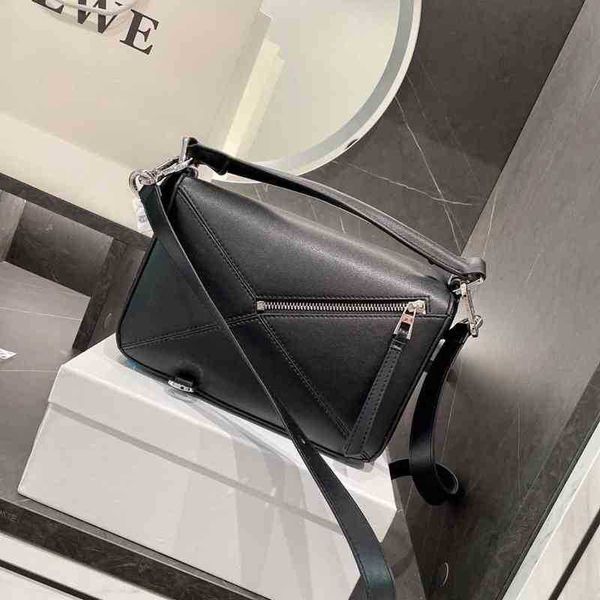 designer bag woman's fashion handbag loew's cowhide geometric bag couple single shoulder student net red high-end quality high lev
designer bag woman's fashion handbag loew's cowhide geometric bag couple single shoulder student net red high-end quality high lev