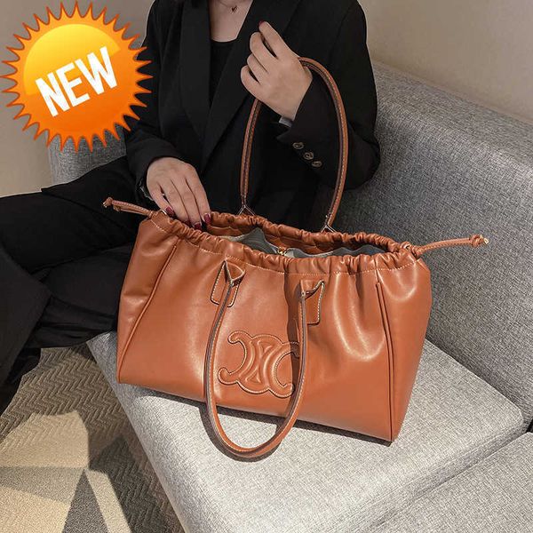 luxury designer bags women's 2023 autumn new triumphal arch texture soft leather tote large capacity commuter hand single shoulder fact
luxury designer bags women's 2023 autumn new triumphal arch texture soft leather tote large capacity commuter hand single shoulder fact