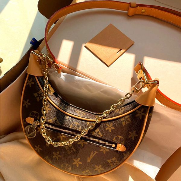 9a quality designer loop half moon handbag cowhide genuine leather women classic luxury fashion shoulder crossbody bag straps metal chain vi
9a quality designer loop half moon handbag cowhide genuine leather women classic luxury fashion shoulder crossbody bag straps metal chain vi