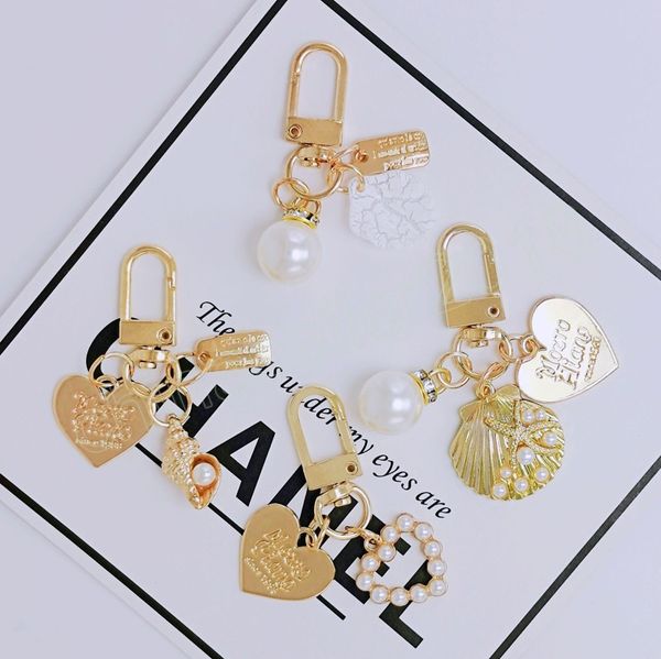 pearl shell keychain creative small gift ins metal love small pendant ornament key chain accessories cute, Silver
pearl shell keychain creative small gift ins metal love small pendant ornament key chain accessories cute, Silver