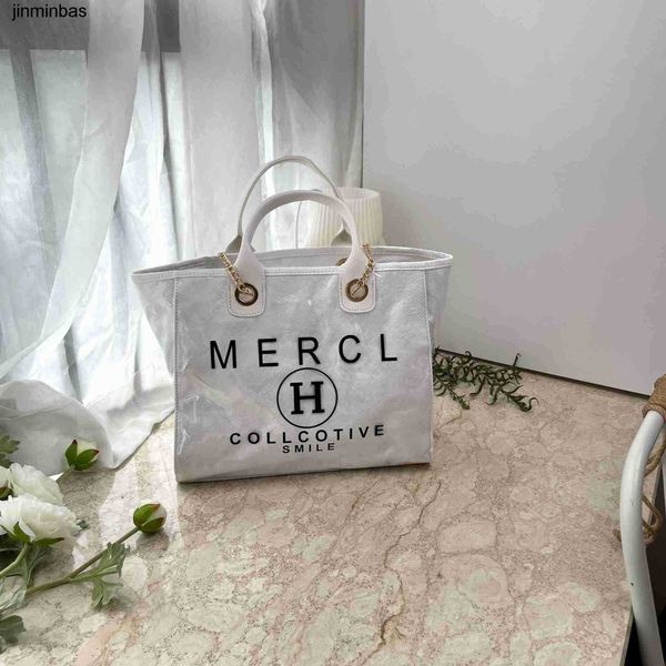 handbag shop 80% wholesale and retail 2023 transparent pvc imitation kraft paper h letter chain handbag street trend large capacity dupont t
handbag shop 80% wholesale and retail 2023 transparent pvc imitation kraft paper h letter chain handbag street trend large capacity dupont t