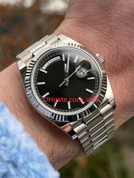 president watch 40mm day-date 228239 18k white gold black roman dial box/papers, Slivery;brown
president watch 40mm day-date 228239 18k white gold black roman dial box/papers, Slivery;brown