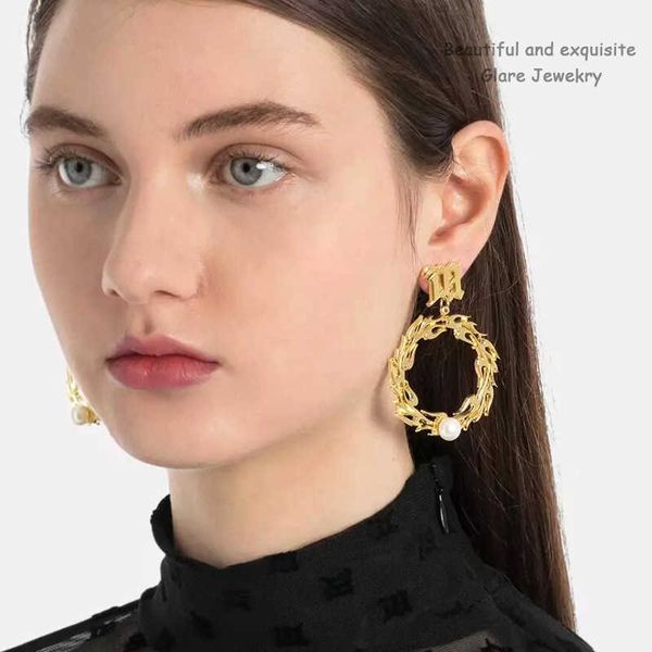 exaggerated metal jewelry letter earrings european and american circle shaped shaped personality pearl earrings 221130, Golden
exaggerated metal jewelry letter earrings european and american circle shaped shaped personality pearl earrings 221130, Golden