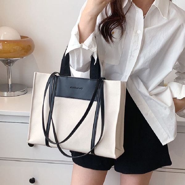 tote bag with printed letters and wide straps is a new vintage cross-body bag from the designer of luxury brand 2023 a11
tote bag with printed letters and wide straps is a new vintage cross-body bag from the designer of luxury brand 2023 a11