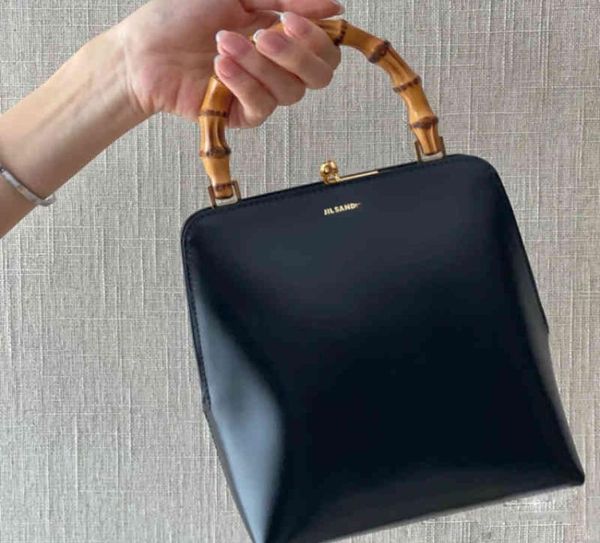 jil sander jil frame mouth gold handbag bamboo festival hand held baguette bag women leather bag women summer 2207254962214
jil sander jil frame mouth gold handbag bamboo festival hand held baguette bag women leather bag women summer 2207254962214