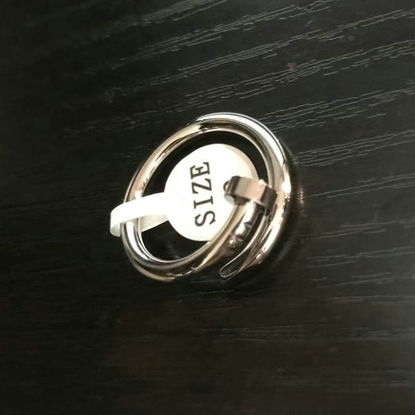designer nail ring woman man love band ring design screw jewelry couple lover silver gold rings with original bag
designer nail ring woman man love band ring design screw jewelry couple lover silver gold rings with original bag