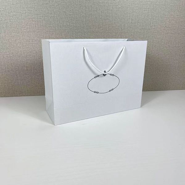 sales designer white packaging bags european and american popular style paper bag large size
sales designer white packaging bags european and american popular style paper bag large size