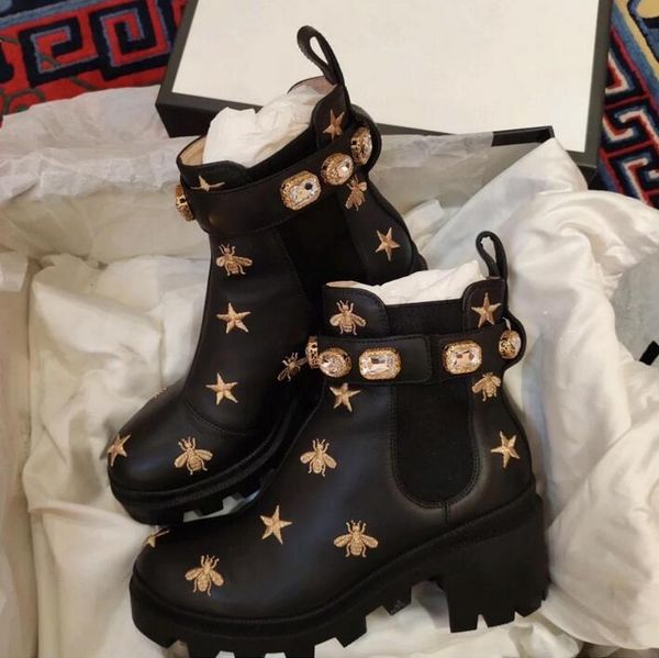 winter woman pop ankle boot black patent leathers belt rhinestone embroidered boots lace-up shoe rubber lug sole and embroidered chunky heel
winter woman pop ankle boot black patent leathers belt rhinestone embroidered boots lace-up shoe rubber lug sole and embroidered chunky heel