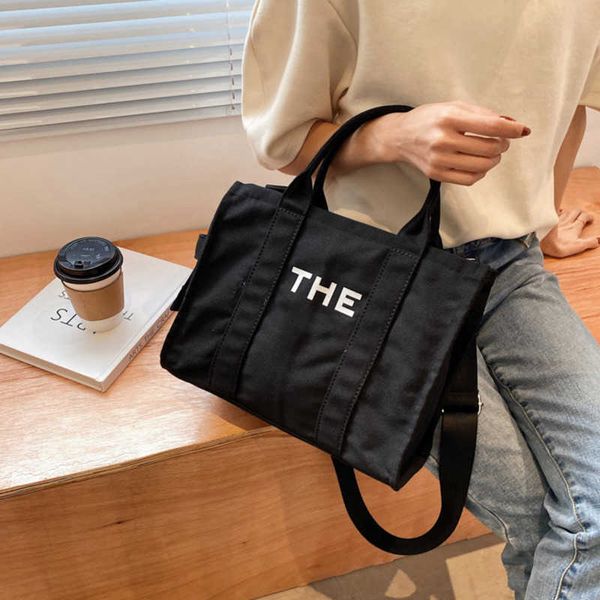 the male designer bags letter printing tote bag canvas handbag fashion crossbody large capacity handbags shoulder women totes shopping
the male designer bags letter printing tote bag canvas handbag fashion crossbody large capacity handbags shoulder women totes shopping