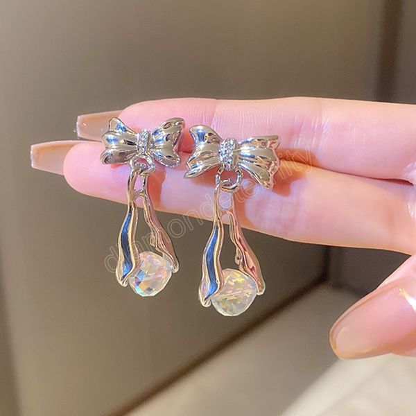 shiny silver color bow-knot dangle earrings crystal ball pendant 925 silver needle piercing ear studs copper accessories for girls
shiny silver color bow-knot dangle earrings crystal ball pendant 925 silver needle piercing ear studs copper accessories for girls