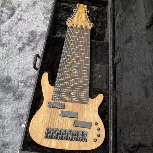 custom 17 strings electric guitar bass mahogany with spalted maple veneer customized on logo shape hardware
custom 17 strings electric guitar bass mahogany with spalted maple veneer customized on logo shape hardware