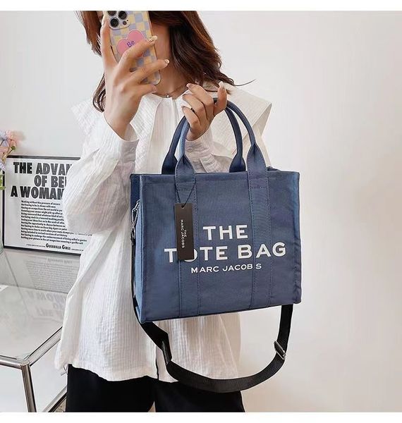 marc the tote bag niche design women's handbag personalized creative canvas bag versatile large capacity portable tote bag a1
marc the tote bag niche design women's handbag personalized creative canvas bag versatile large capacity portable tote bag a1