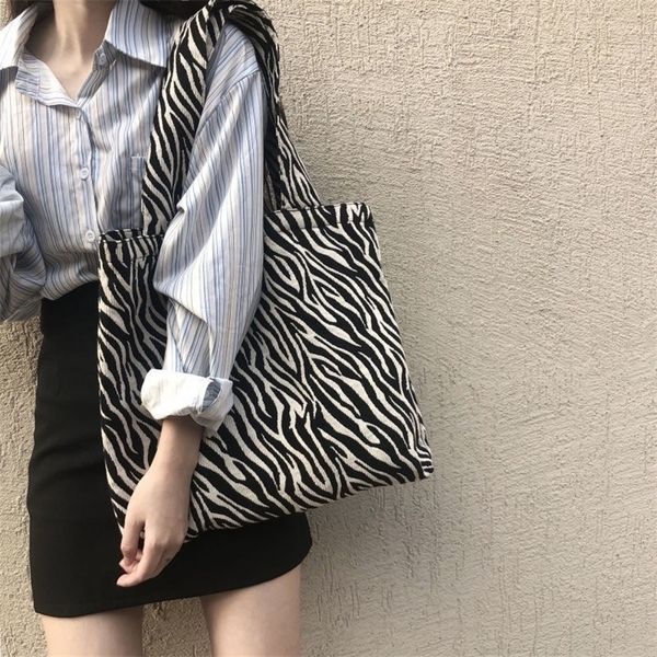 evening bags fashion large capacity zebra canvas handbag women luxury shoulder shopping tote casual travel underarm bag 221006
evening bags fashion large capacity zebra canvas handbag women luxury shoulder shopping tote casual travel underarm bag 221006