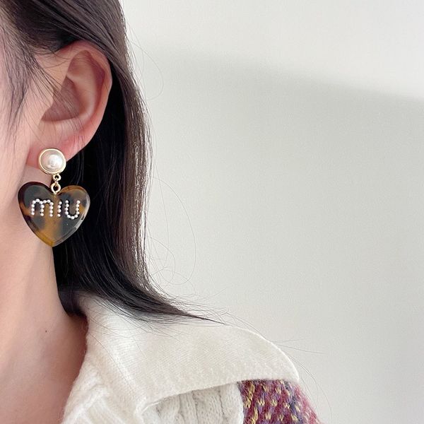 women earrings acrylic leopard heart studs with pearl designer jewelry earring letters printed sweet ear ornaments fashion style, Golden;silver
women earrings acrylic leopard heart studs with pearl designer jewelry earring letters printed sweet ear ornaments fashion style, Golden;silver