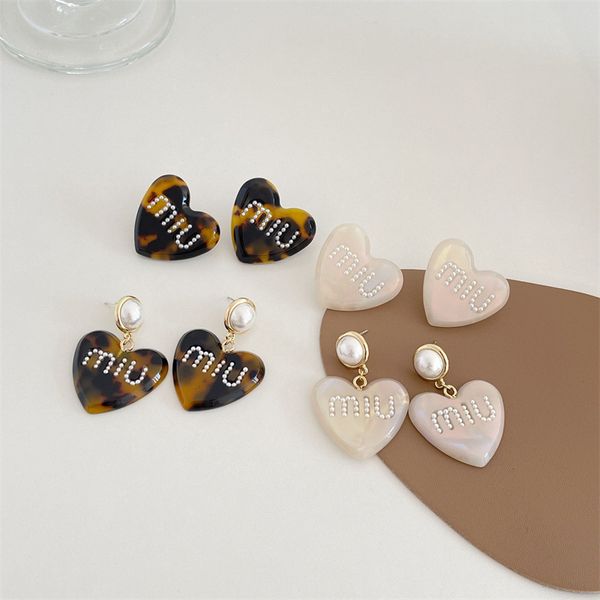 women earrings leopard heart studs with pearl letters designer jewelry acrylic earring sweet ear ornaments for girl fashion style, Golden;silver
women earrings leopard heart studs with pearl letters designer jewelry acrylic earring sweet ear ornaments for girl fashion style, Golden;silver