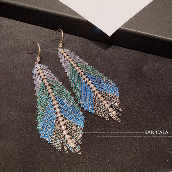 2022 new niche design dangle heavy industry colourful blue feather zircon clasp chain long earline female autumn winter geometric exaggerate, Silver
2022 new niche design dangle heavy industry colourful blue feather zircon clasp chain long earline female autumn winter geometric exaggerate, Silver