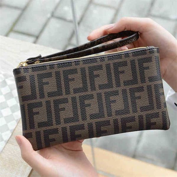 70% off 2023 designer bag hand wallet women's long personalized zipper mobile phone large capacity multi card wallet, Red;black
70% off 2023 designer bag hand wallet women's long personalized zipper mobile phone large capacity multi card wallet, Red;black