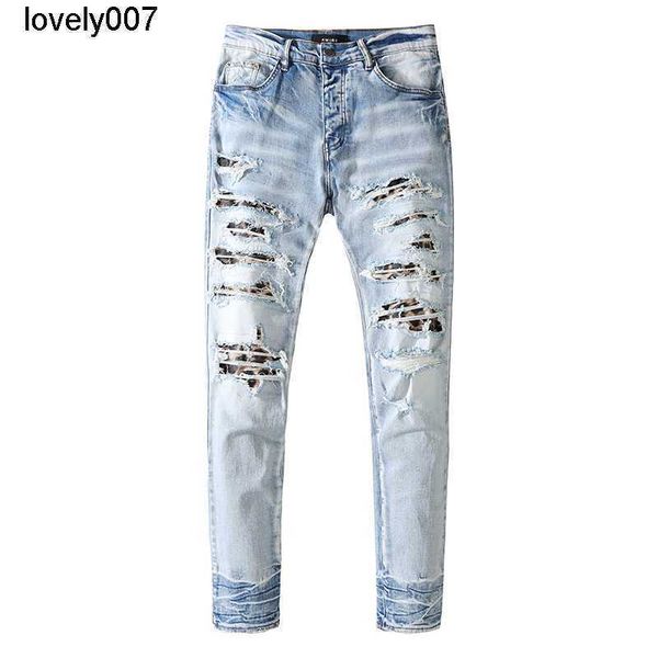 designer men's jeans amirs hole washing leopard patch pants young men's fashion slim fit jeans, Blue
designer men's jeans amirs hole washing leopard patch pants young men's fashion slim fit jeans, Blue