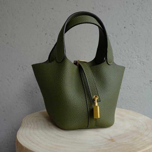 designer herme bag women's large fashion classic bounded half hand sewn tc leather mini vegetable basket picotin hand-held mobile phone
designer herme bag women's large fashion classic bounded half hand sewn tc leather mini vegetable basket picotin hand-held mobile phone