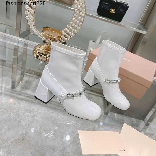 designer boots miu fashion brand minority black pearl metal chain short boot women thick heel square head high heel elastic slim booties
designer boots miu fashion brand minority black pearl metal chain short boot women thick heel square head high heel elastic slim booties